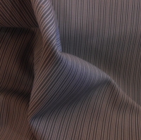 grijze powerstretch tricot met lengte streep