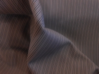 grijze powerstretch tricot met lengte streep