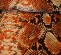 viscose tricot met roodbruin slangenmotief