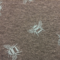 lichtblauwe bijtjes op gemeleerde grijze tricot ondergrond