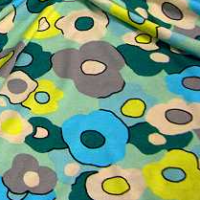 soepele flink elastische tricot met mint, geel, aqua bloemen