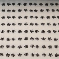 Wit tricot met zwarte print van kleine bloemetjes