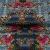Digitaal bedrukte tricot van Stenzo met ornamenten op blauwe slangenprint