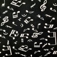 Katoen zwart met witte muzieknootjes