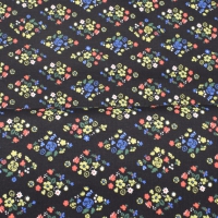 Zwart katoen met folklore bloemen