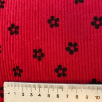 Bedrukte ribfluweel rood met zwarte bloemetjes