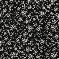 zwart viscose met klein wit bloemetje en iets oranje